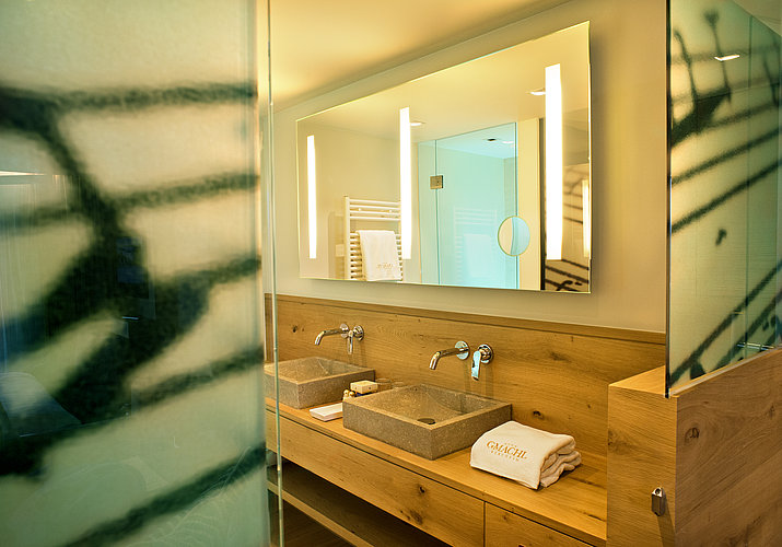 Bathroom with view of the terrace at Hotel Gmachl
